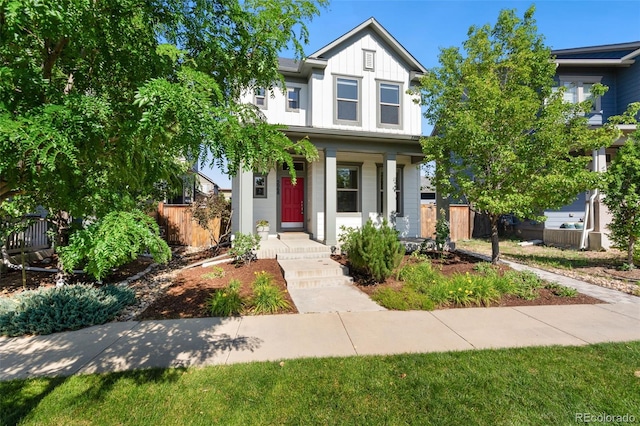 5068 Yosemite Ct, Denver, CO 80238 - view of front of house featuring board and batten siding and a porch