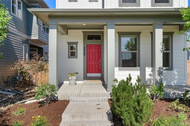 5068 Yosemite Ct, Denver, CO 80238 - property entrance featuring a porch and board and batten siding