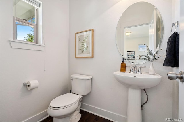 5068 Yosemite Ct, Denver, CO 80238 - bathroom featuring wood finished floors and healthy amount of natural light
