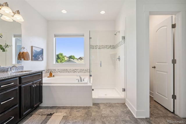 5068 Yosemite Ct, Denver, CO 80238 - full bath with a stall shower, vanity, and a garden tub