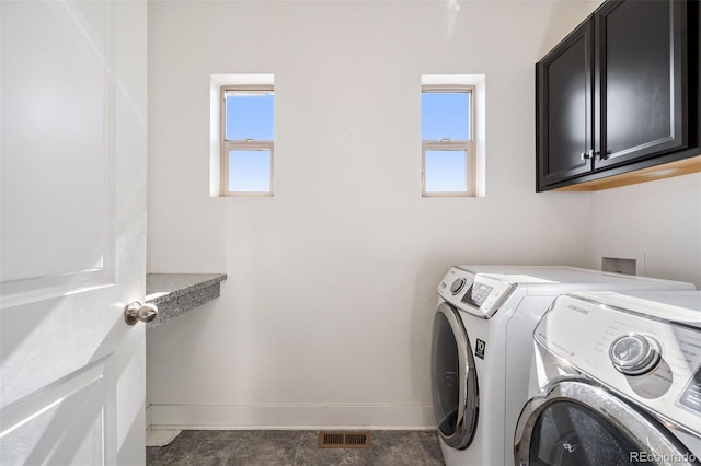 5068 Yosemite Ct, Denver, CO 80238 - laundry area with cabinet space, separate washer and dryer, and healthy amount of natural light