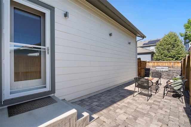 5068 Yosemite Ct, Denver, CO 80238 - view of patio / terrace with exterior kitchen