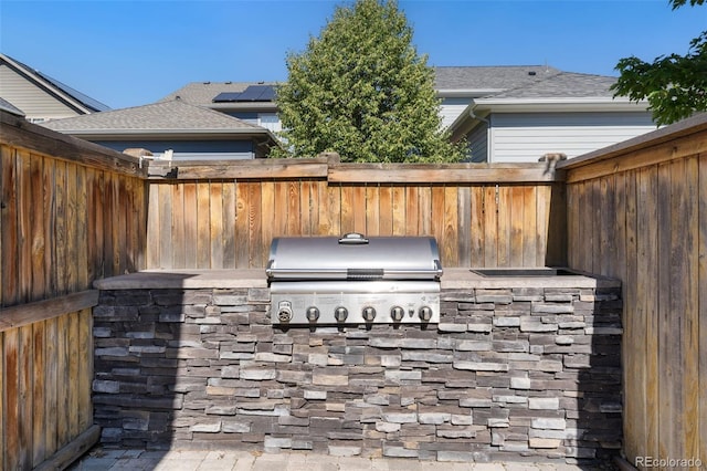 5068 Yosemite Ct, Denver, CO 80238 - fenced backyard with area for grilling