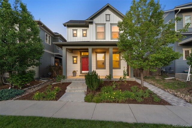 5068 Yosemite Ct, Denver, CO 80238 - view of front facade with board and batten siding and a porch