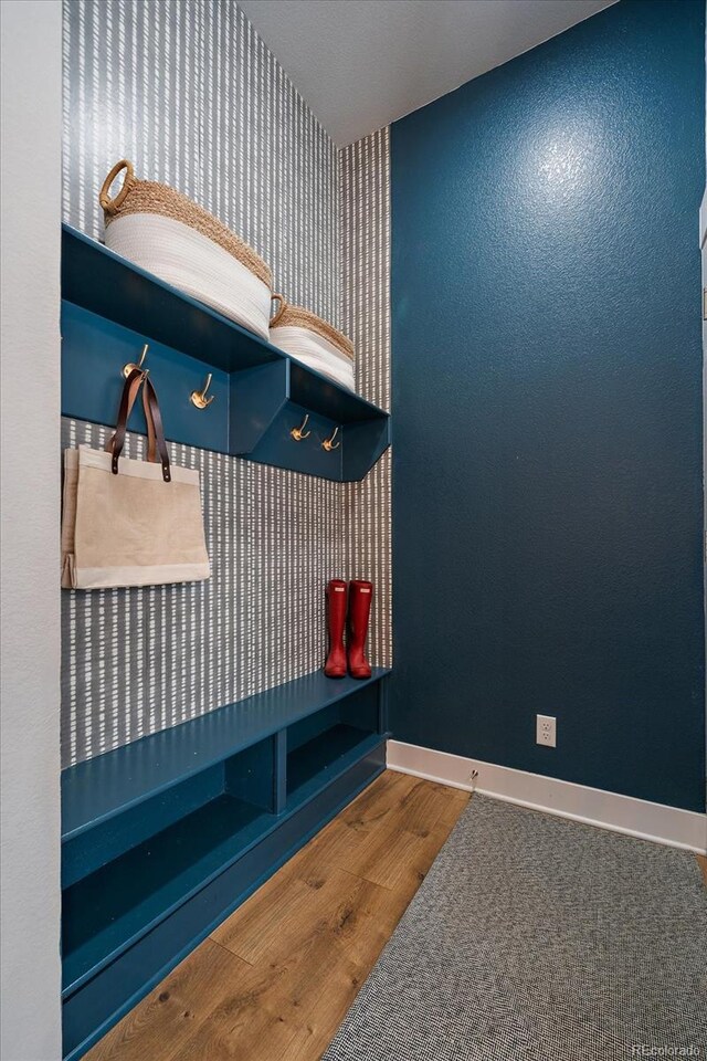 5663 W 96th Ave, Westminster, CO 80020 - mudroom featuring baseboards and wood finished floors