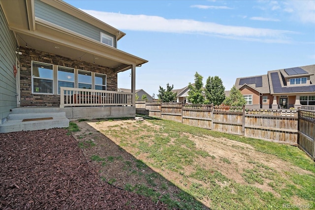 5663 W 96th Ave, Westminster, CO 80020 - fenced backyard with a porch