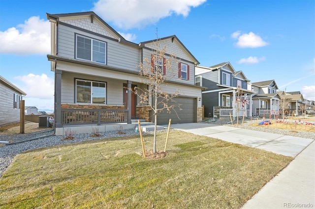 27684 E Byers Ave, Aurora, CO 80018 - craftsman-style house featuring covered porch, concrete driveway, a garage, a residential view, and a front yard