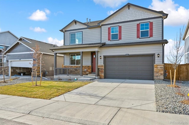 27684 E Byers Ave, Aurora, CO 80018 - craftsman-style home featuring a porch, stone siding, concrete driveway, and an attached garage