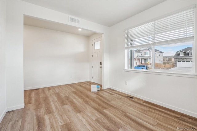 27684 E Byers Ave, Aurora, CO 80018 - spare room featuring baseboards, wood finished floors, and recessed lighting