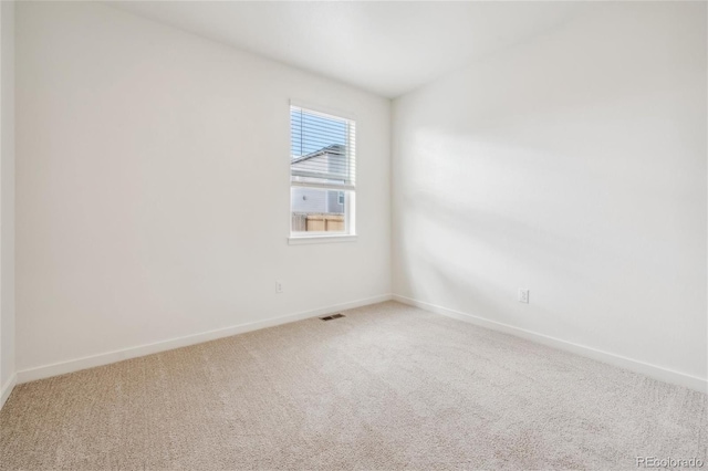 27684 E Byers Ave, Aurora, CO 80018 - carpeted empty room with baseboards
