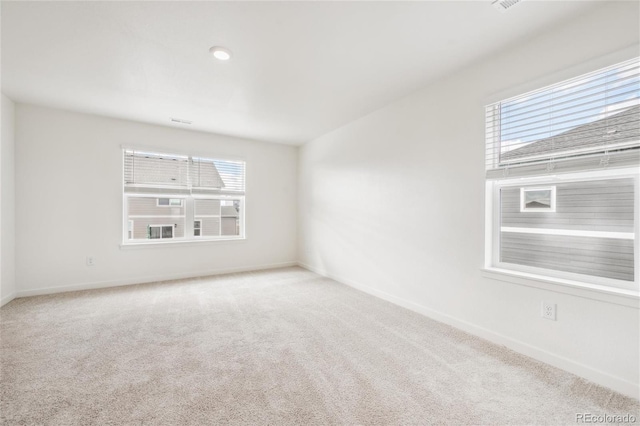 27684 E Byers Ave, Aurora, CO 80018 - spare room with plenty of natural light and carpet
