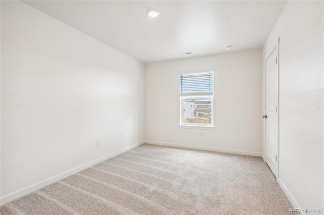 27684 E Byers Ave, Aurora, CO 80018 - spare room with light carpet and baseboards
