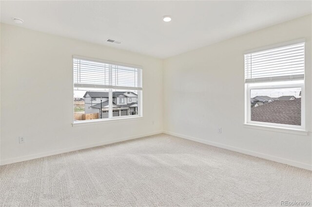 27684 E Byers Ave, Aurora, CO 80018 - carpeted spare room with healthy amount of natural light and baseboards