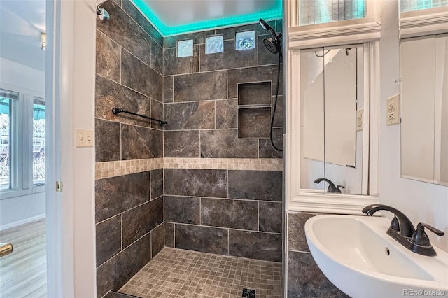8095 E Lehigh Ave, Denver, CO 80237 - full bathroom with a sink and tiled shower