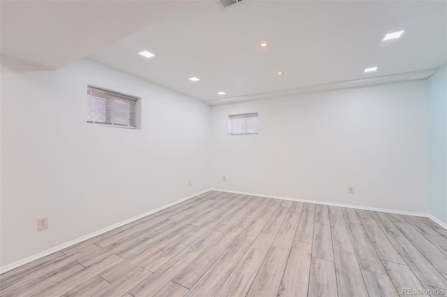 8095 E Lehigh Ave, Denver, CO 80237 - below grade area featuring light wood-type flooring, baseboards, and recessed lighting
