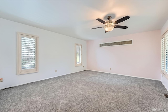 8095 E Lehigh Ave, Denver, CO 80237 - carpeted spare room with a ceiling fan and baseboards