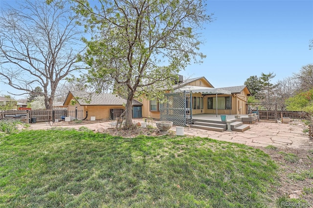 8095 E Lehigh Ave, Denver, CO 80237 - back of property featuring a patio, outdoor lounge area, and a deck