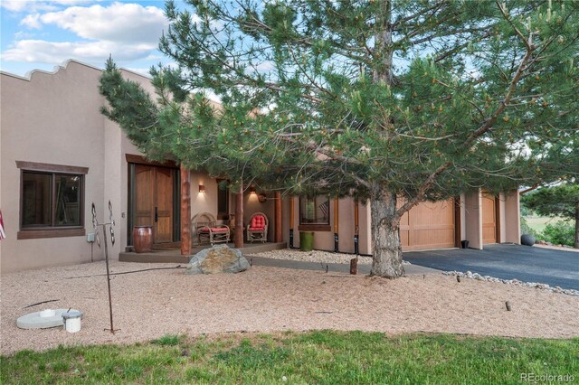 view of front of property featuring a garage