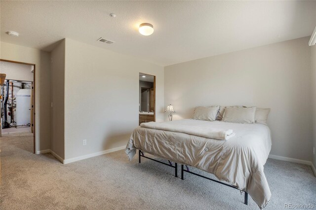 carpeted bedroom with a textured ceiling