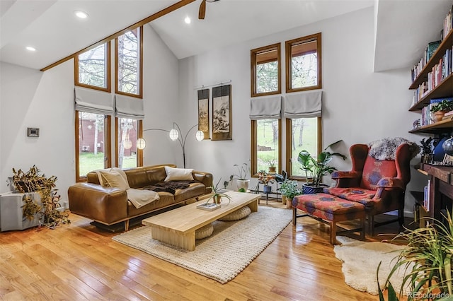 23646 Genesee Village Rd, Golden, CO 80401 - living area with high vaulted ceiling, plenty of natural light, light wood-style floors, and recessed lighting