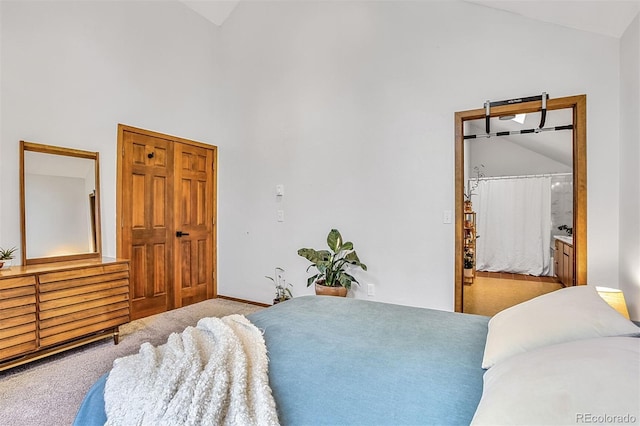 23646 Genesee Village Rd, Golden, CO 80401 - carpeted bedroom with high vaulted ceiling and connected bathroom