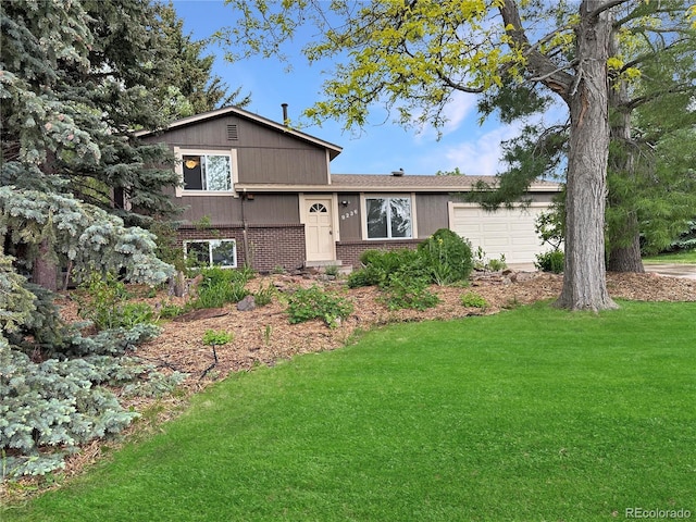 9236 W Euclid Ave, Littleton, CO 80123 - tri-level home with brick siding, a garage, and a front lawn