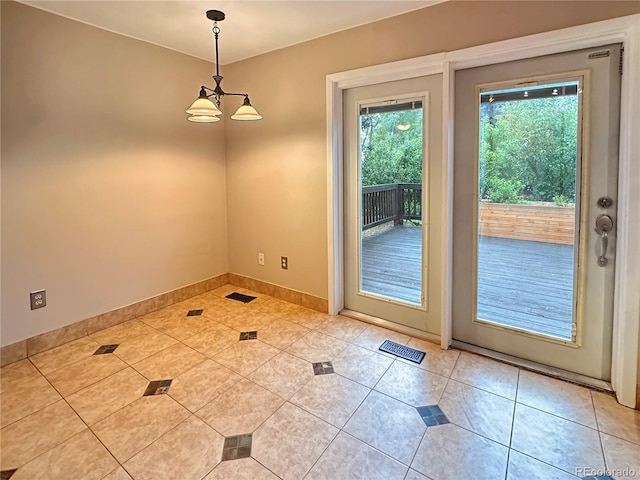 9236 W Euclid Ave, Littleton, CO 80123 - entryway with light tile patterned flooring and baseboards
