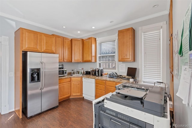 kitchen with crown molding, appliances with stainless steel finishes, sink, and dark wood-type flooring