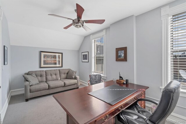 office area with lofted ceiling, carpet flooring, and ceiling fan