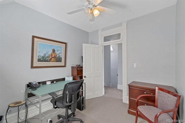 office space with ceiling fan and light colored carpet