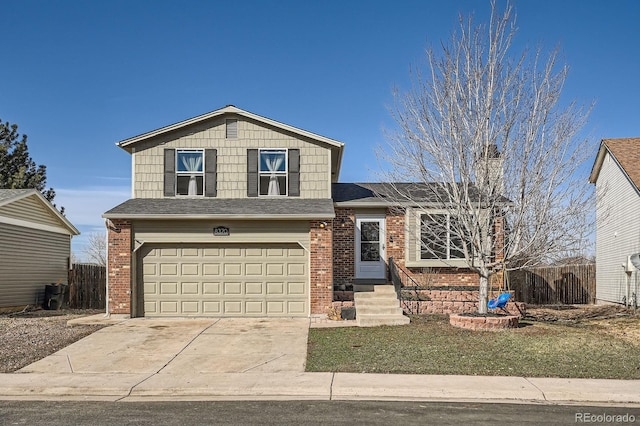 tri-level home featuring brick siding, fence, concrete driveway, a chimney, and an attached garage