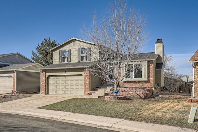 view of front of house with brick siding, driveway, an attached garage, and a chimney