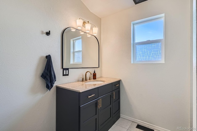 bathroom with visible vents, marble finish floor, vanity, and baseboards