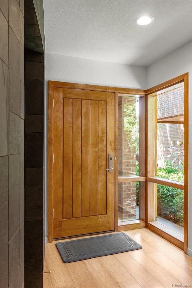 350 Holly St, Denver, CO 80220 - foyer featuring wood finished floors and recessed lighting