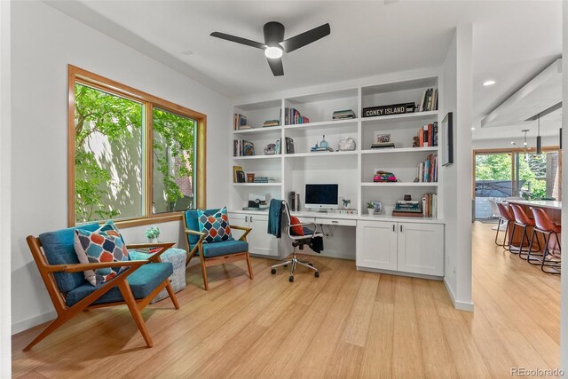 350 Holly St, Denver, CO 80220 - home office featuring light wood-style flooring, a ceiling fan, built in study area, and recessed lighting
