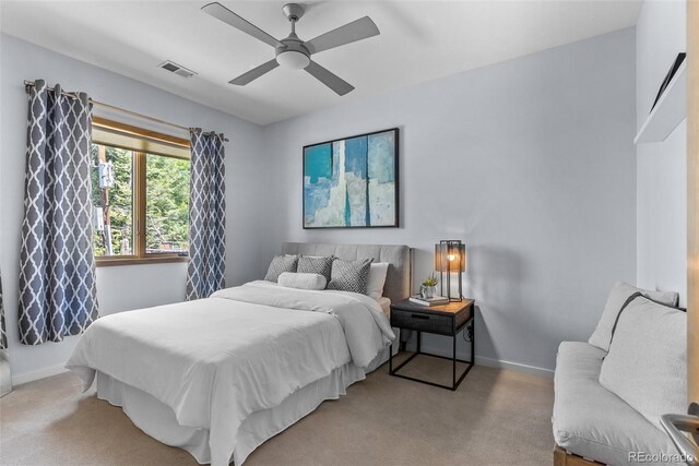 350 Holly St, Denver, CO 80220 - carpeted bedroom with baseboards and a ceiling fan