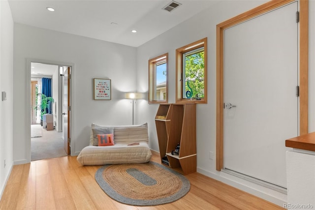 350 Holly St, Denver, CO 80220 - sitting room with wood finished floors, recessed lighting, and baseboards