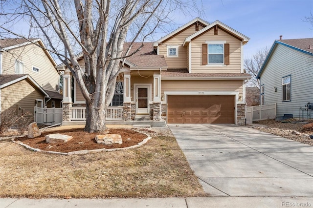 craftsman-style home with a garage