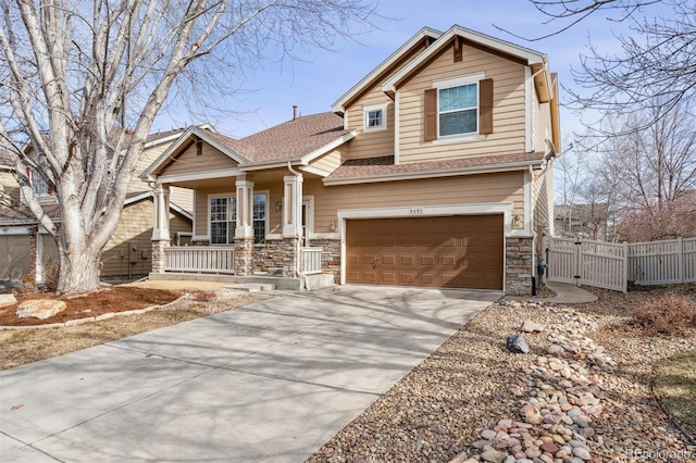 craftsman-style home featuring a garage and a porch