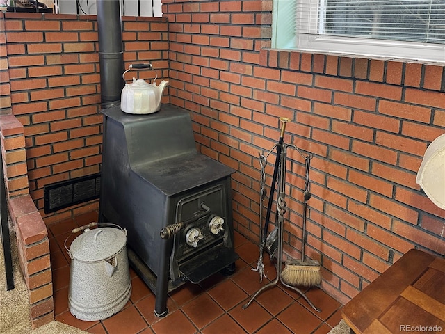 interior details featuring visible vents and a wood stove