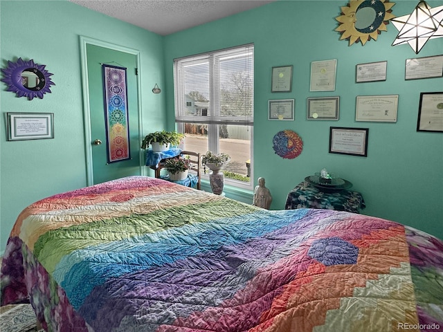 bedroom with a textured ceiling