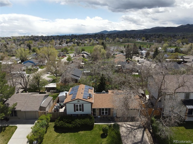 birds eye view of property with a residential view and a mountain view