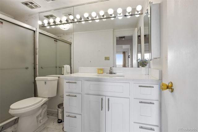 bathroom with toilet, a shower with door, and vanity