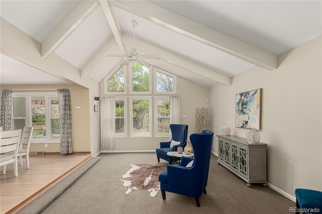 living area featuring carpet floors, visible vents, baseboards, ceiling fan, and vaulted ceiling with beams