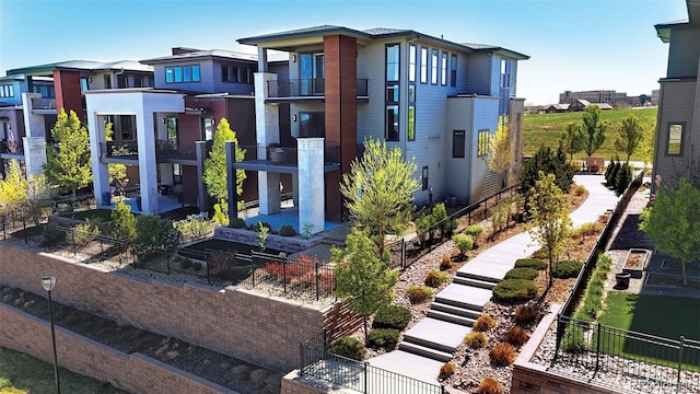 10119 Bellwether Ln, Lone Tree, CO 80124 - exterior space featuring fence private yard, a residential view, and a balcony