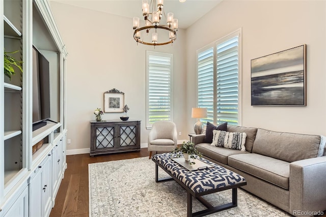 10119 Bellwether Ln, Lone Tree, CO 80124 - living room featuring baseboards, dark wood finished floors, and a chandelier
