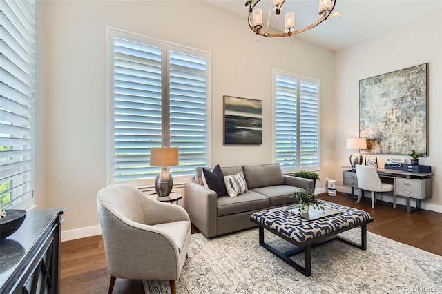 10119 Bellwether Ln, Lone Tree, CO 80124 - living area with baseboards, wood finished floors, and a chandelier