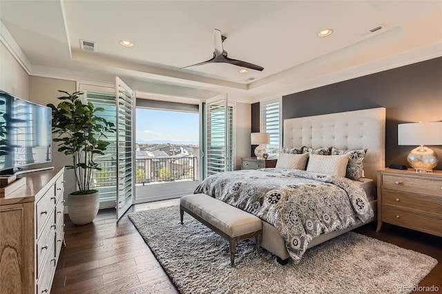 10119 Bellwether Ln, Lone Tree, CO 80124 - bedroom featuring access to outside, a tray ceiling, and visible vents