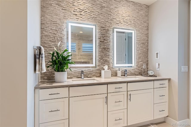 10119 Bellwether Ln, Lone Tree, CO 80124 - bathroom with double vanity, a sink, and backsplash