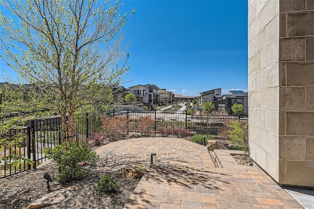 10119 Bellwether Ln, Lone Tree, CO 80124 - view of patio / terrace with fence and a residential view